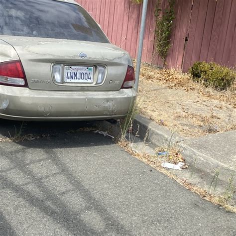 Abandoned Inoperative Vehicle Parked On Public Street Alley Or