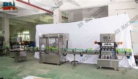 Famous Brand Automatic Bottle Liquid Gravity Alcohol Filling Machine