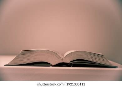 Open Book On Table Sepia Toned Stock Photo 1921385111 Shutterstock