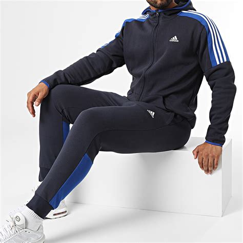 Adidas Uomo Tuta MTS Fleece CB Blu Felpata Con Cappuccio HK4463 AXJN