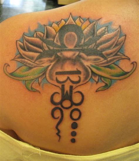 Libra and Flower Tattoo Design - Tattoos Designs