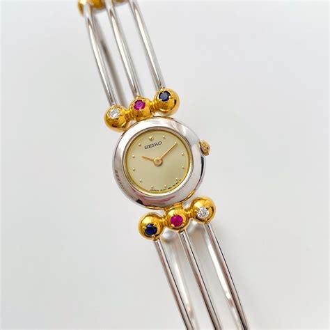 Very Rare 1990s Two Tone Seiko Articulated Bangle Quartz Watch With Three Coloured Gemstones Etsy