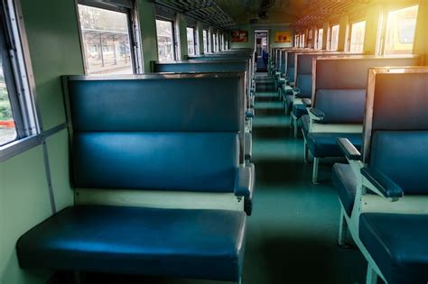 Premium Photo | Seat on the old train with evening sun.