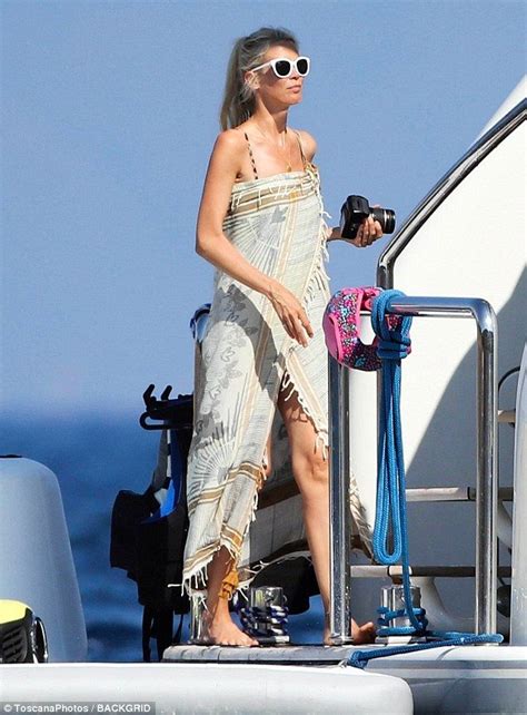 Claudia Schiffer Applies Lotion To Her Toned Frame In Leopard Bikini Leopard Print Bikini