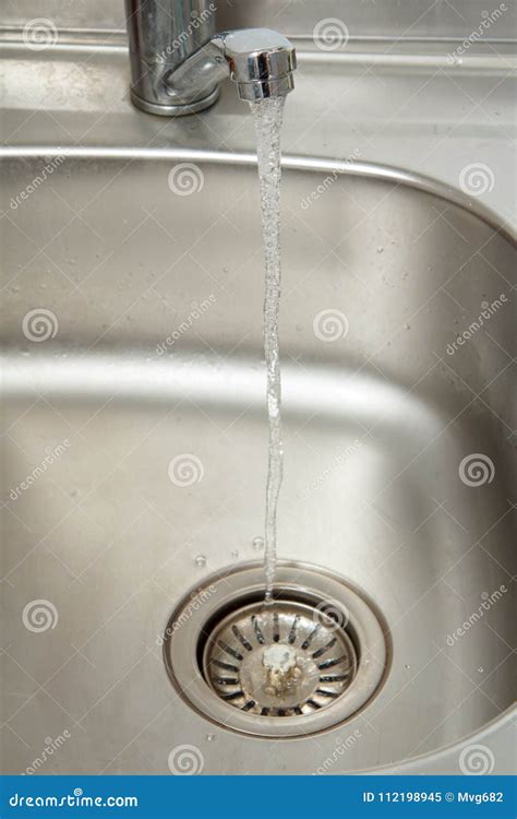 Stream Of Water Flows From An Open Chrome Tap Stock Image Image Of