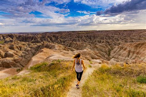 Woman Hiking Her Way Through The Scenic Badlands South Dakota United