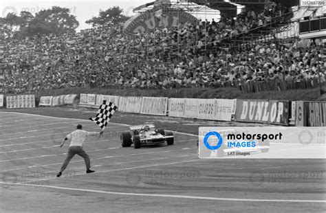 Jochen Rindt Lotus 72C Ford Takes The Chequered Flag For Victory Ahead