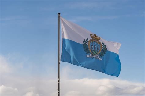 Premium Photo San Marino National Flag Cloth Fabric Waving On The Sky