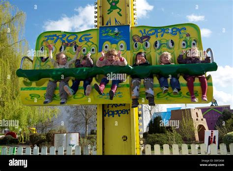 Children riding on a fairground ride at Flamingo land resort in North