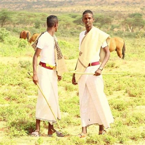 Two Guys Dressed In Traditional Somali Attire In The Northern Nugaal