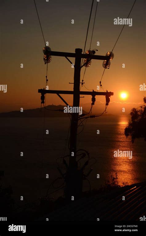 electric power lines at sunset Stock Photo - Alamy