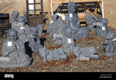 Buddha garden statues Stock Photo - Alamy