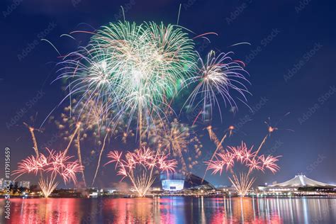 Beautiful Singapore national day fireworks at national stadium. Stock Photo | Adobe Stock