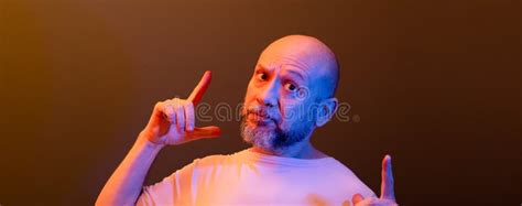 Happy Bald Bearded Man Making Funny Hand Gestures Concept Of Strength