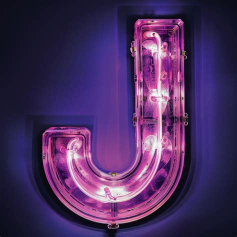 Premium Photo Letter J Neon Sign On Dark Background