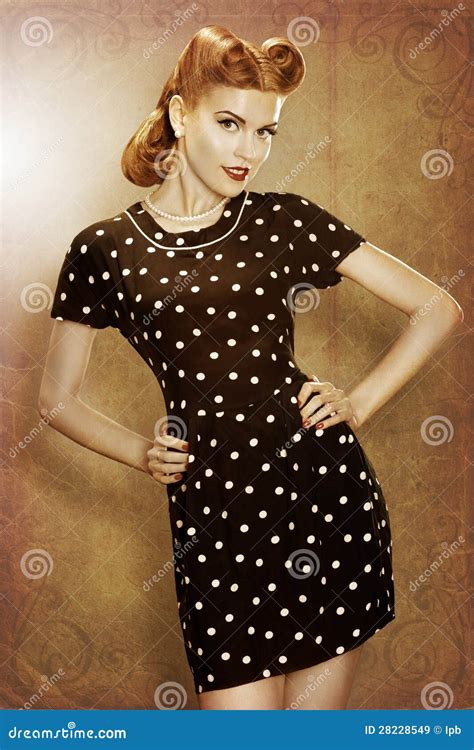 Pin Up Retro Girl In Classic Fashion Polka Dots Dress Posing Stock