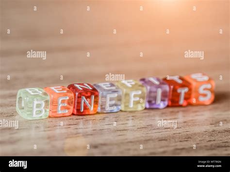 Benefits Word Made From Different Colors Building Block On Table