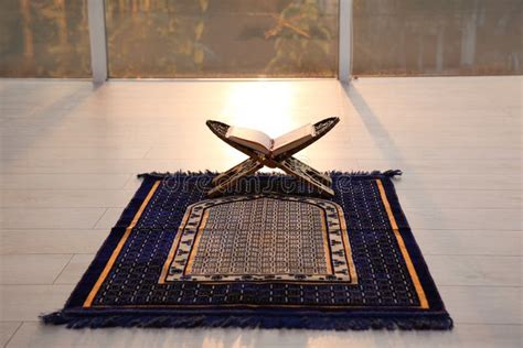 Rehal with Open Quran on Muslim Prayer Mat Stock Photo - Image of ...