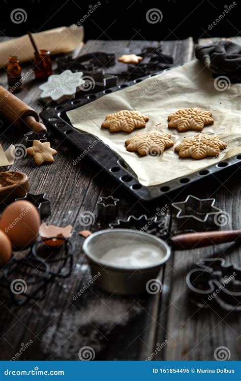 Baked Christmas Gingerbread Cookies On Baking Tray With Parchment Stock