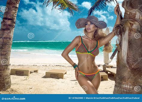 Beautiful Bikini Woman Posing On The Caribbean Beach Stock Photo