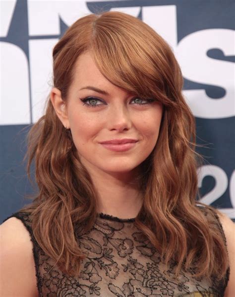 Emma Stone Shows Off An Auburn Hair Color With Blonde Highlights Photo