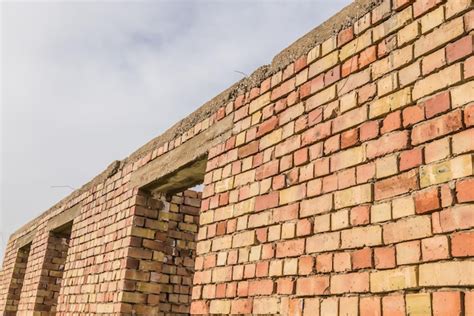 Premium Photo | Brick wall Construction of a brick building