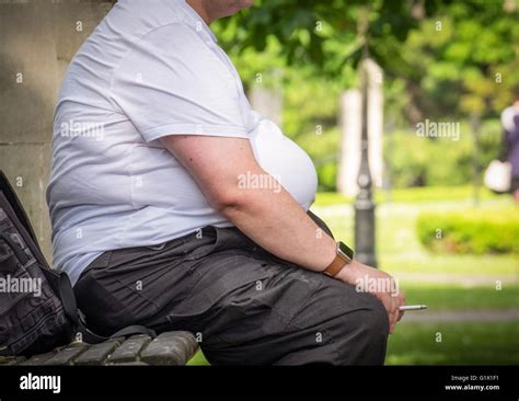 Fat Man Sitting Park Hi Res Stock Photography And Images Alamy