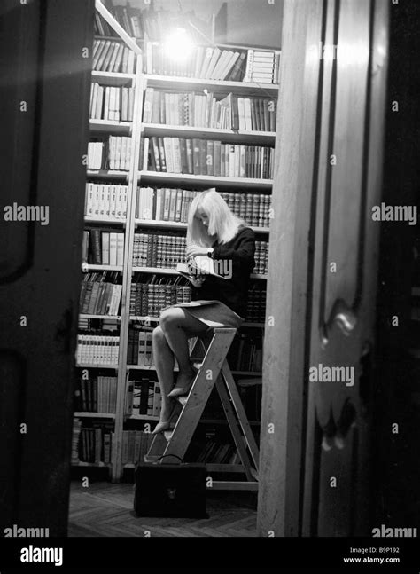 Girl On Library Ladder High Resolution Stock Photography And Images Alamy