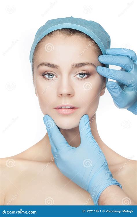 Plastic Surgery Concept Doctor Hands In Gloves Touching Woman Face