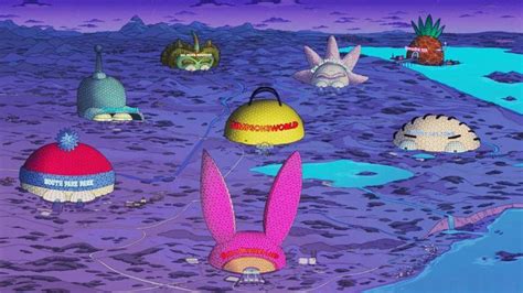 several knitted objects are floating in the water on an alien land with ...