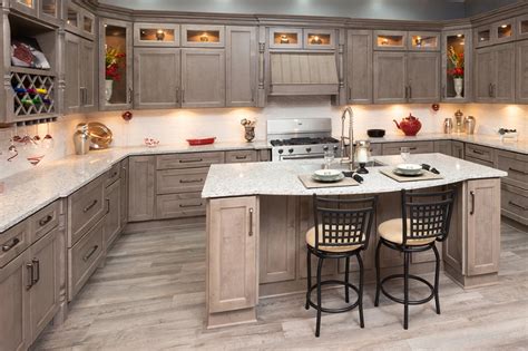 Large Ash Brown Stained Kitchen Cabinets With Stacked Display Wall