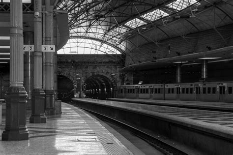 Premium Photo | Train station in black and white Railway station