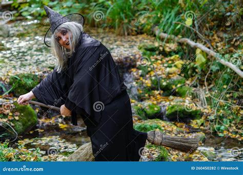 White Haired Witch Flying On Her Broom Stock Photo Image Of White