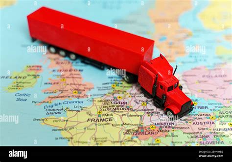 Truck with trailer on the Europe map Stock Photo - Alamy