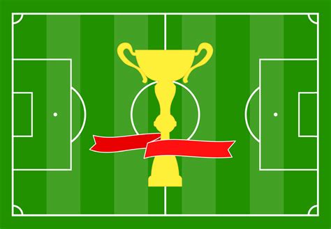 Football Field With Green Grass And With A Gold Cup With A Red Ribbon