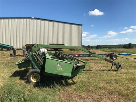 John Deere 300 Swather Bigiron Auctions