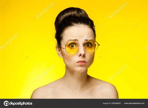 Pretty Woman Naked Shoulders Yellow Glasses Emotions Cropped View Stock Photo By ShotStudio