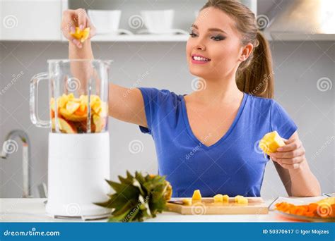 Woman Making Fruits Smoothies With Juicer Machine Stock Image Image