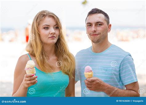 Man And Woman Eating Ice Cream On Beach Stock Photo Image Of Romance