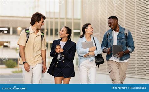 Group of College Friends Walking Outdoors in University Campus Stock ...