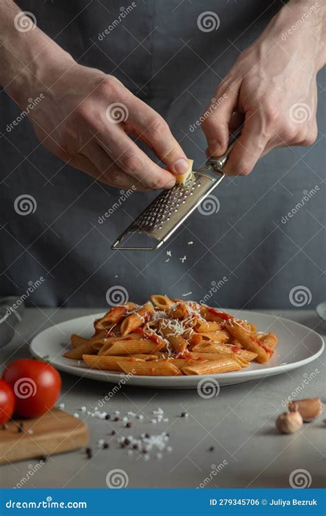 Man cooking pasta stock photo. Image of noodles, italian - 279345706