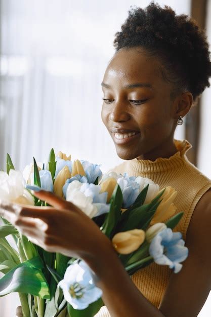 Free Photo African Girl With Blossom Bouquet Of Tulips In Hands