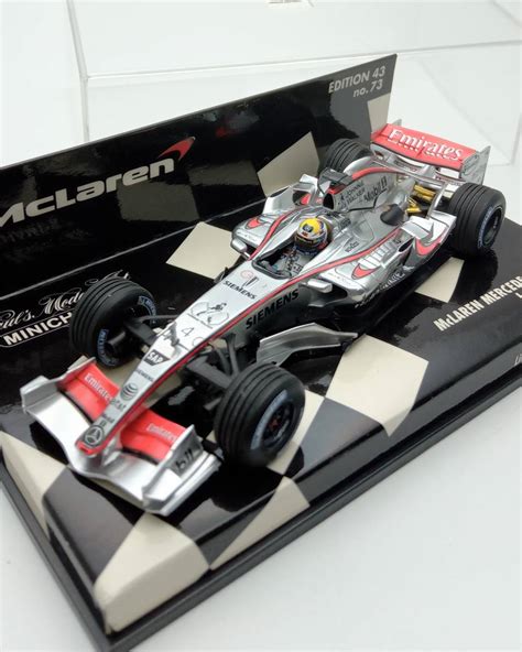 やや傷や汚れありMINICHAMPS ミニチャンプス MaLAREN MERCEDES MP4 21 J P MONTOYA 2006