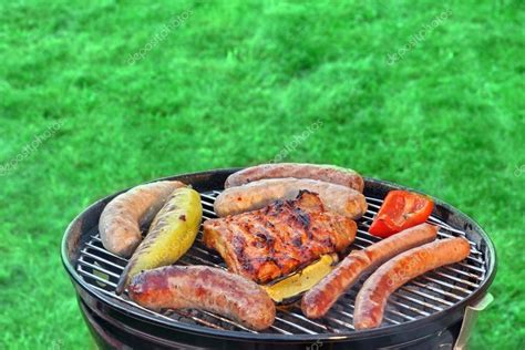 Hot BBQ Grill With Assorted Meat On The Garden Lawn — Stock Photo ...