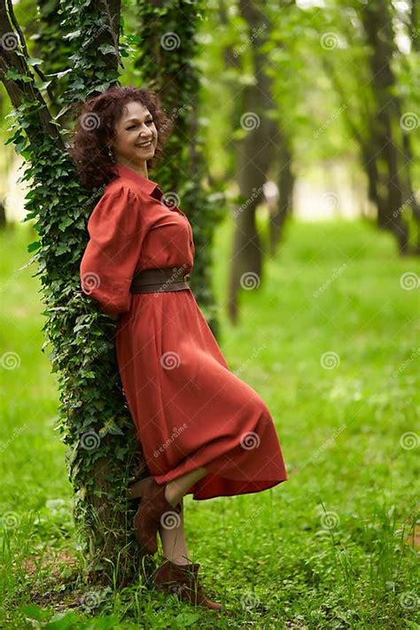 Candid Of A Mature Curly Hair Redhead Woman Stock Image Image Of