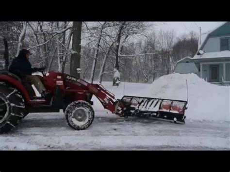 tractor plowing snow  big plow youtube