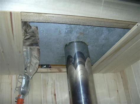 Правила установки трубы в бане через потолок