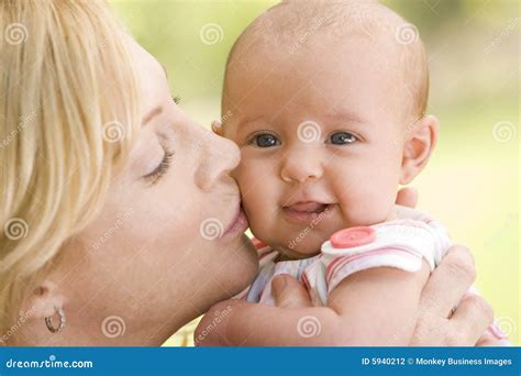 Kissing Baby Feet Royalty Free Stock Photography CartoonDealer