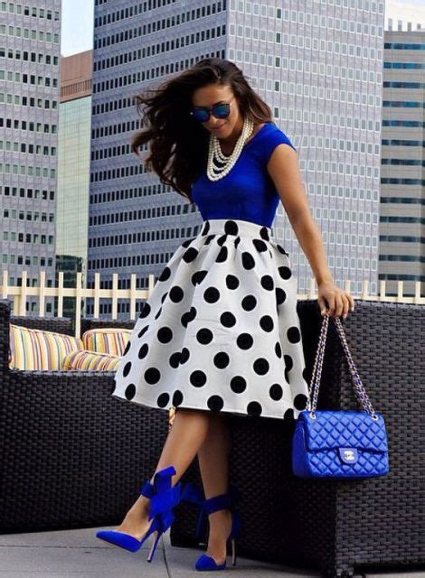 Picture Of With Blue Shirt Polka Dot Skirt And Necklace