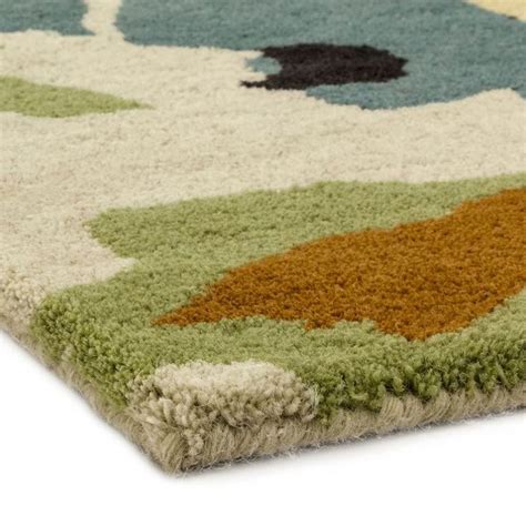 Tapis de prestige moderne à motifs fleuris dans les tons chauds par